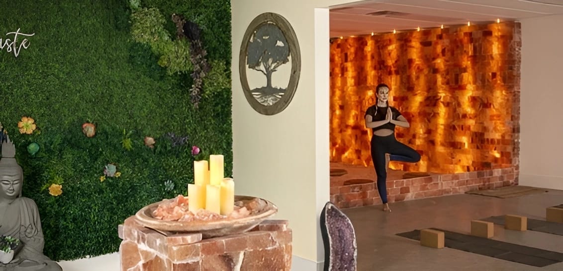 Woman doing a yoga pose in The Halo Sanctuary