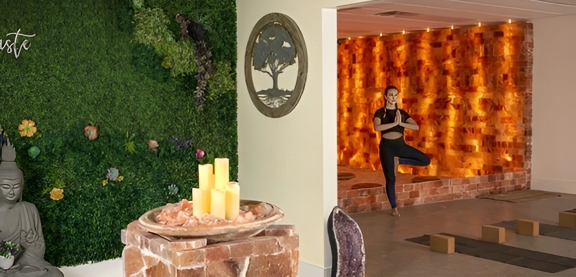 Woman doing a yoga pose in The Halo Sanctuary